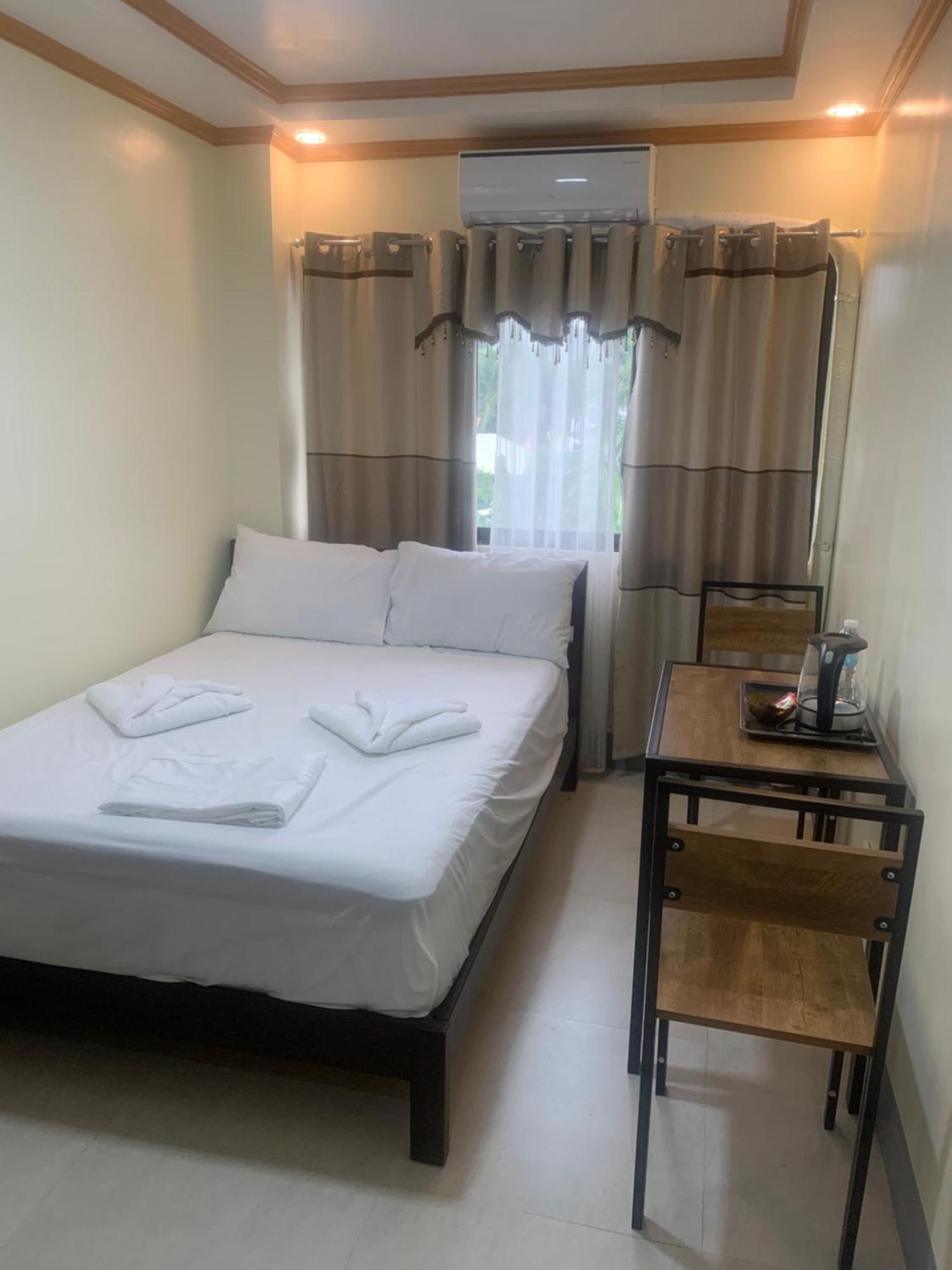 Zl Travelers Inn Batuan Eksteriør bilde